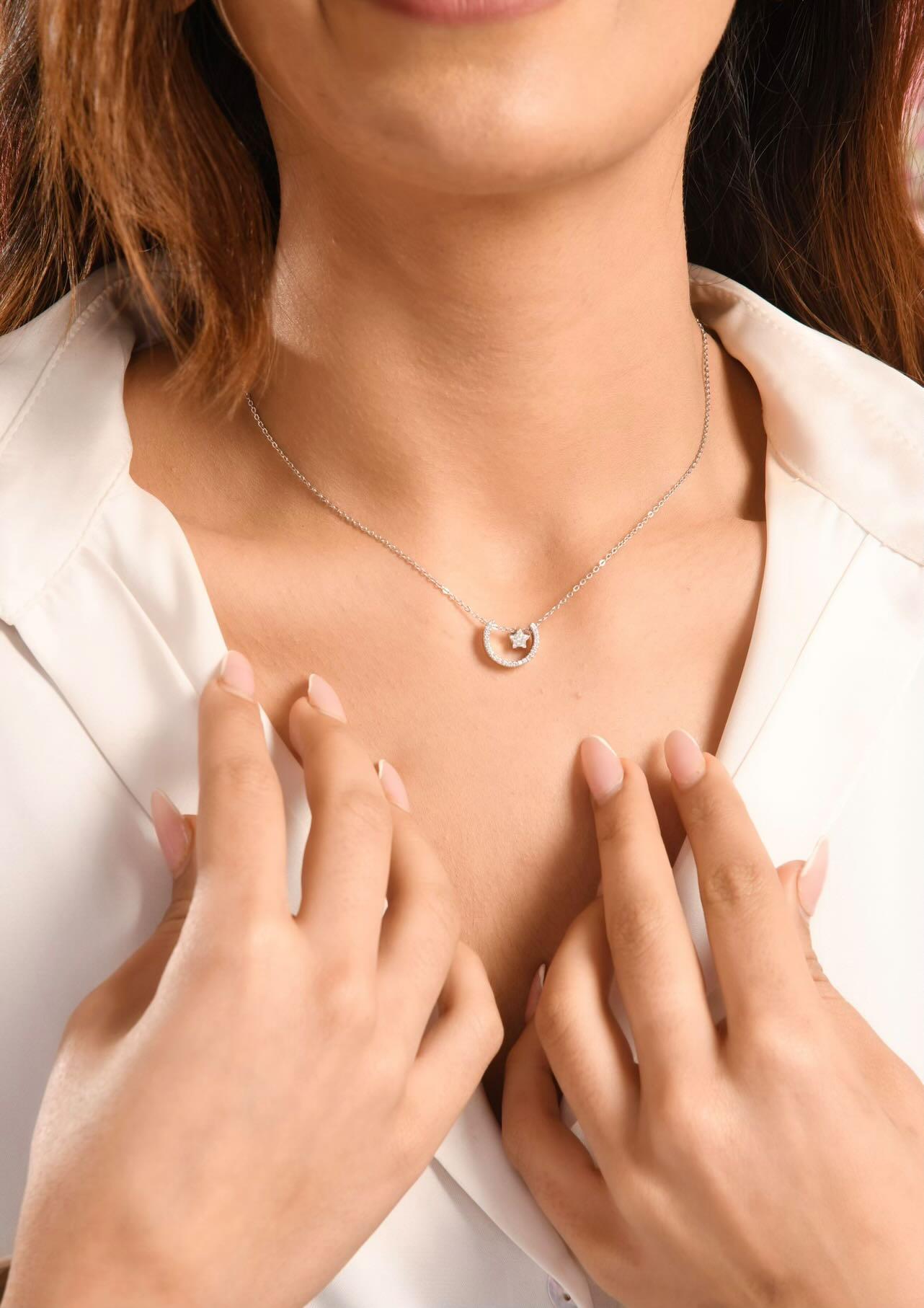 "Captivating Allure: Unleash Your Inner Charisma with this Silver Necklace"
