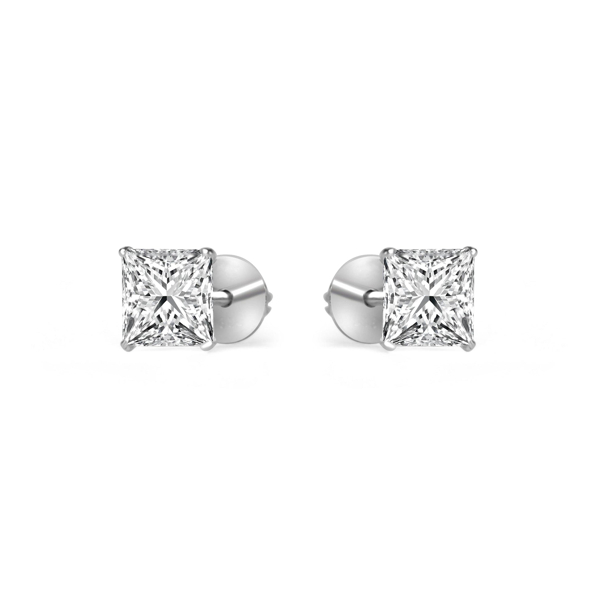 "Artisan-crafted silver tops with a natural gemstone"