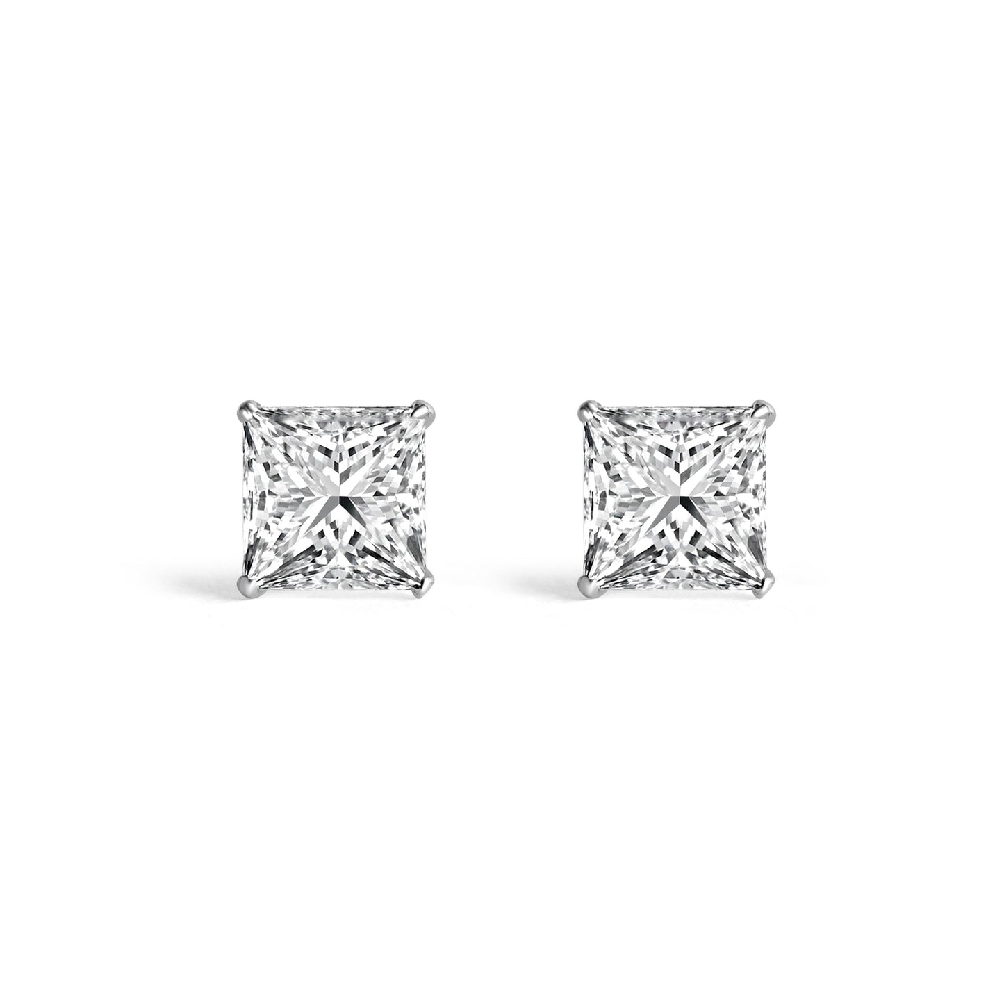 "Sleek silver studs with a modern minimalist aesthetic"