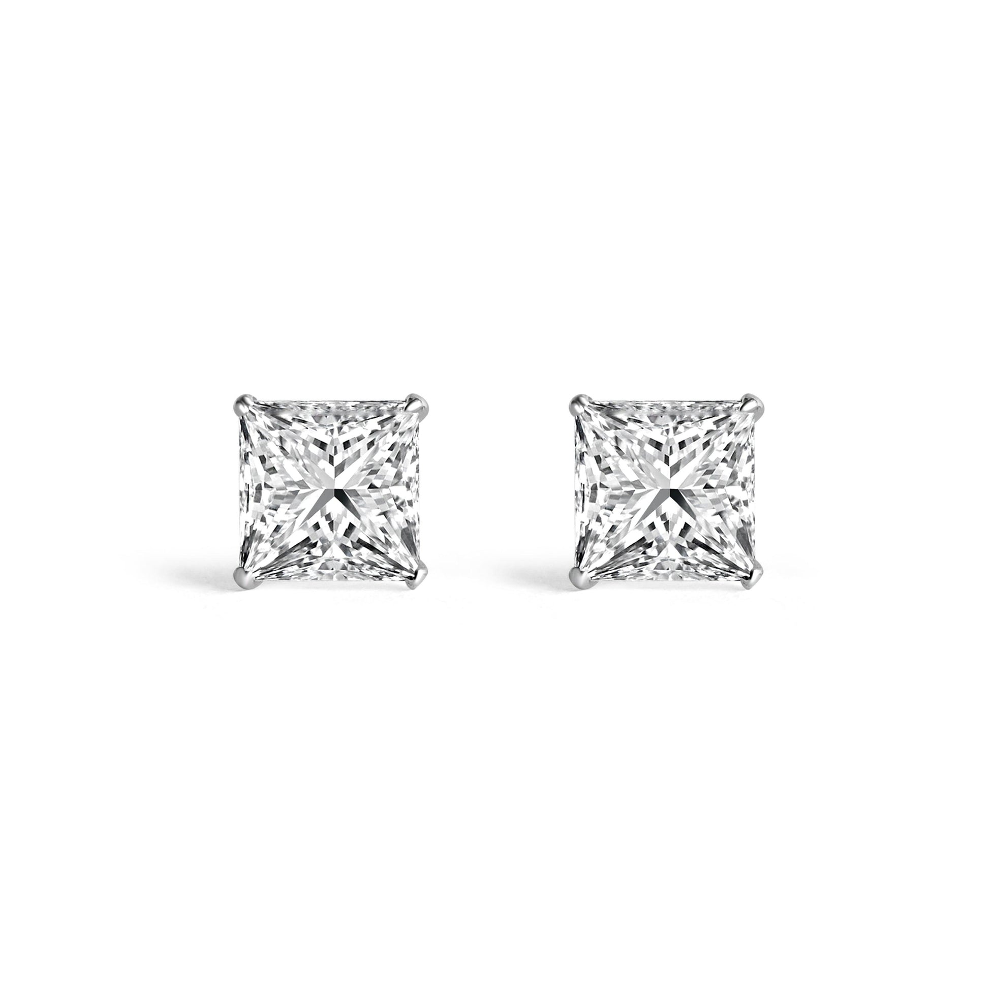 "Sleek silver studs with a modern minimalist aesthetic"